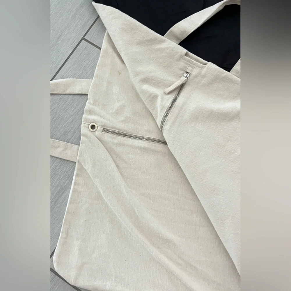 Saint Laurent Black and Cream Cloth Garment Bags. 24X64